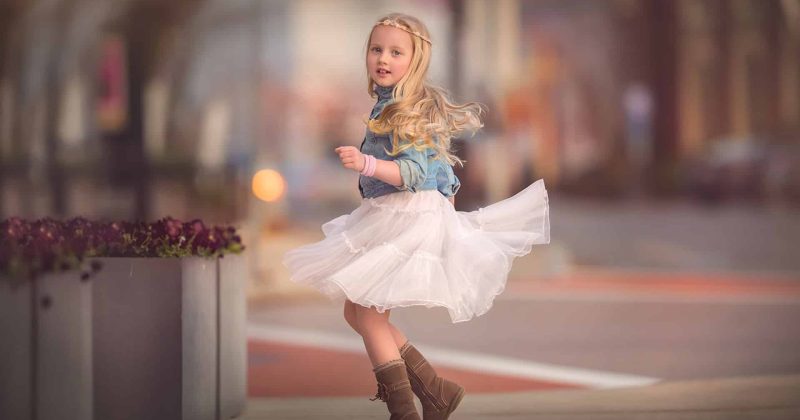 cute_little_girl_is_standing_in_blur_background_wearing_blue_jeans_shirt_and_white_skirt_hd_cute-1920x1080-1